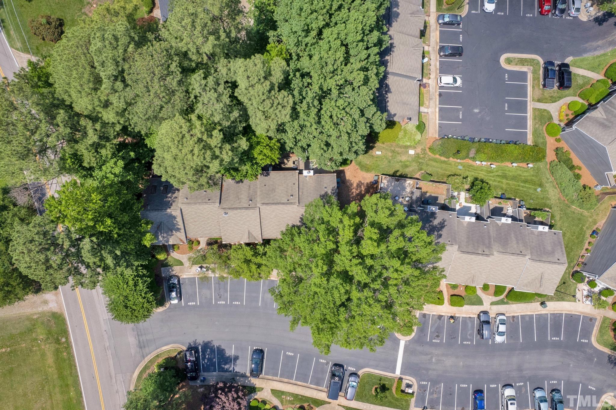 4650 Pine Trace Drive Raleigh, NC 27613 - Photo 26 of 26 an aerial view of a building with outdoor space