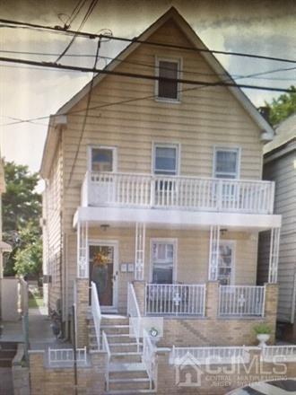 281 Goodwin Street Perth Amboy, NJ 08861 - Photo 1 of 1 a front view of a house