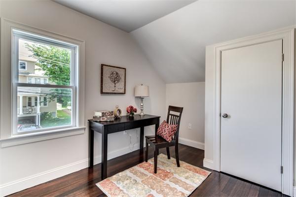 57 Creeley Road Belmont, MA 02478 - Photo 10 of 13 a view of a workspace room with wooden floor wooden table and chair