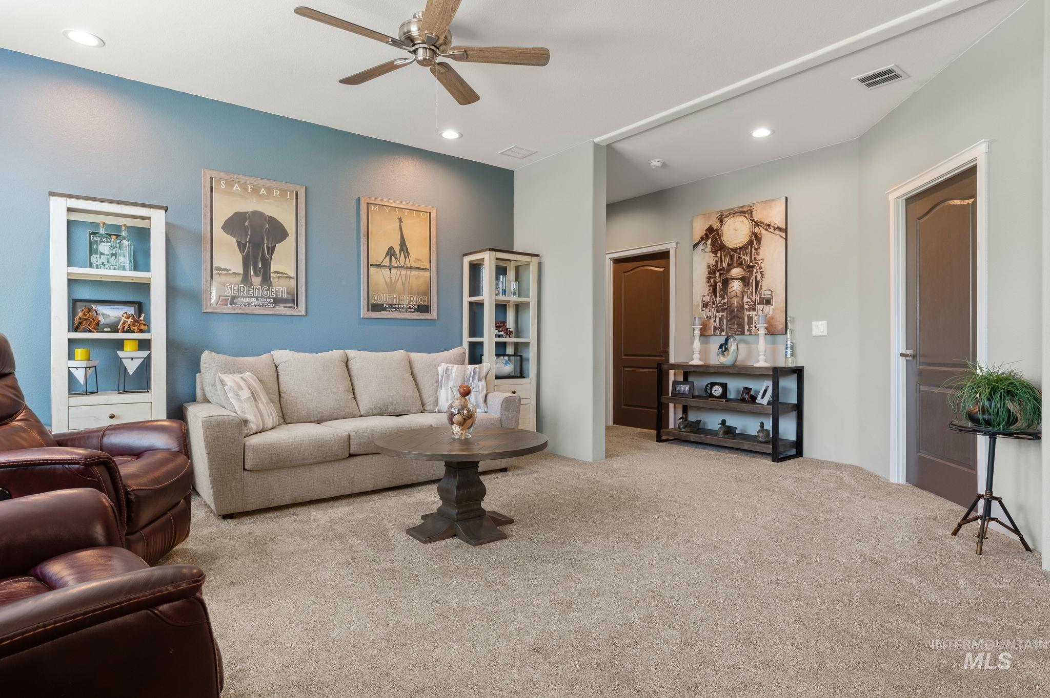 837 Burrell Avenue Lewiston, ID 83501 - Photo 7 of 32 Living room with carpet floors, a ceiling fan, and recessed lighting