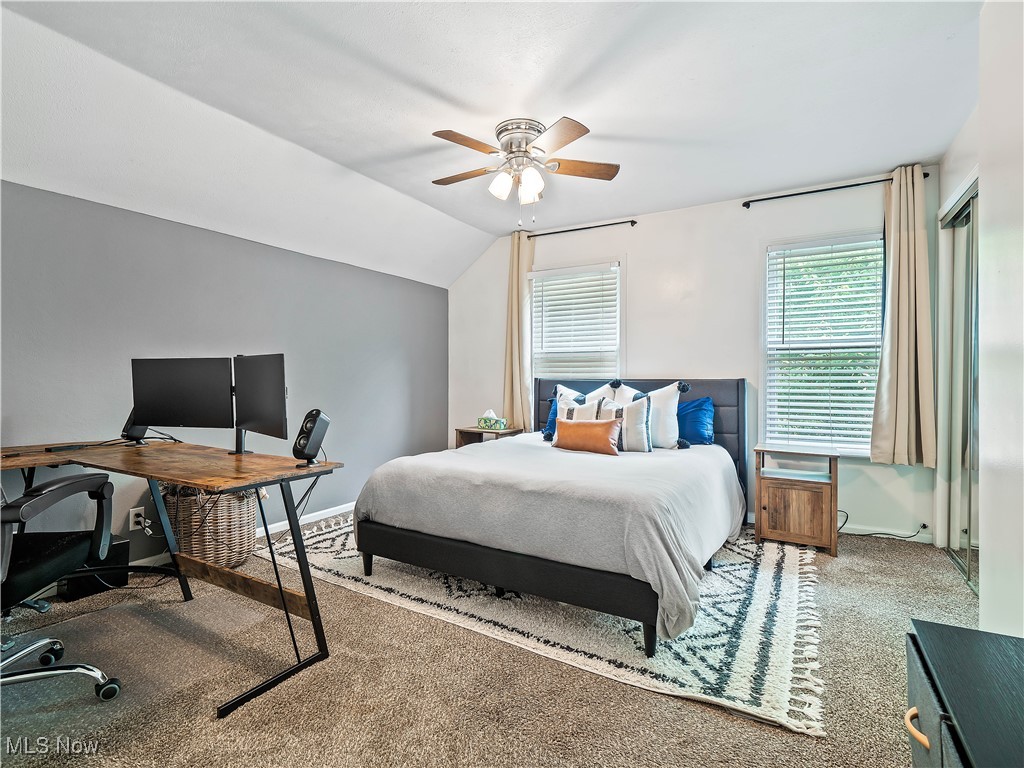 1727 Randall Road Cleveland, OH 44113 - Photo 30 of 40 Bedroom with carpet floors, a desk, vaulted ceiling, and a ceiling fan