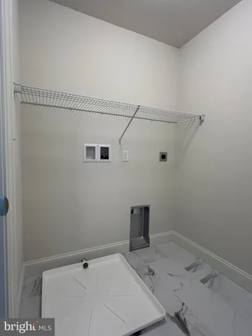 a view of a room with racks on the wall