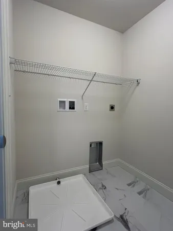 a view of a room with racks on the wall