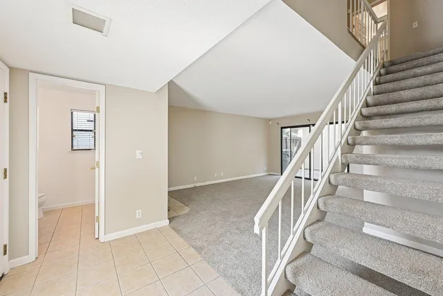 a view of staircase with white walls and white walls