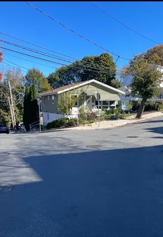 a view of a backyard of the house