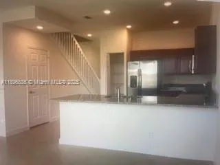 a view of lobby with mirror