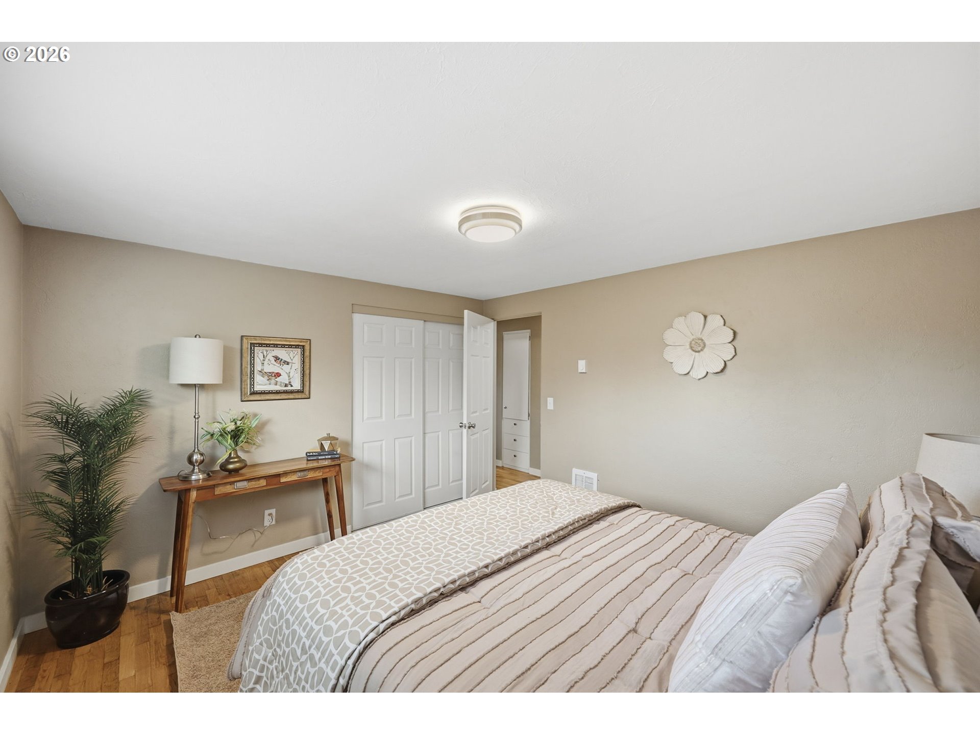 381 Marion Lane Eugene, OR 97404 - Photo 12 of 39 a bedroom with a bed and a table