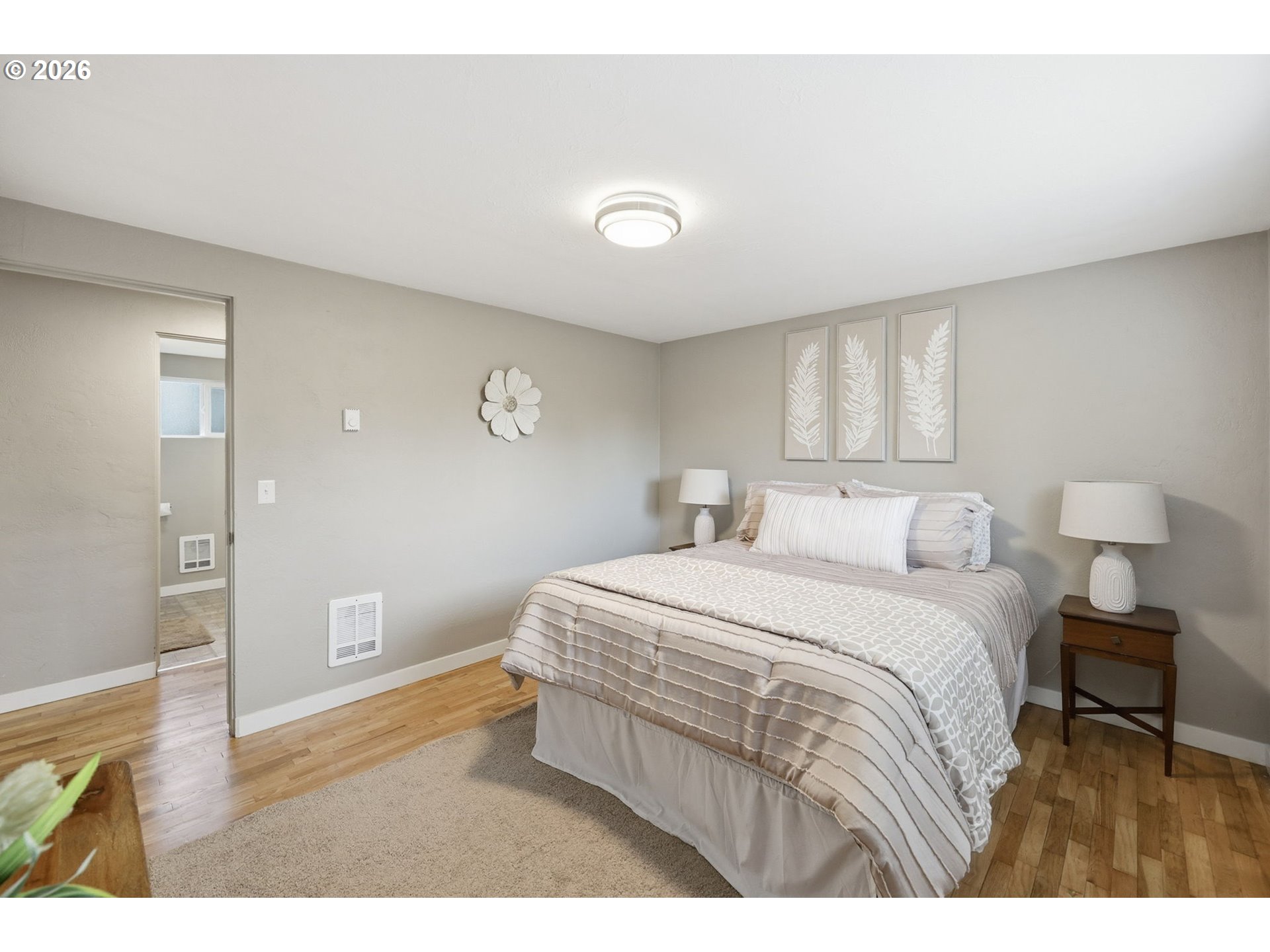 381 Marion Lane Eugene, OR 97404 - Photo 13 of 39 a bedroom with a bed and a night stand