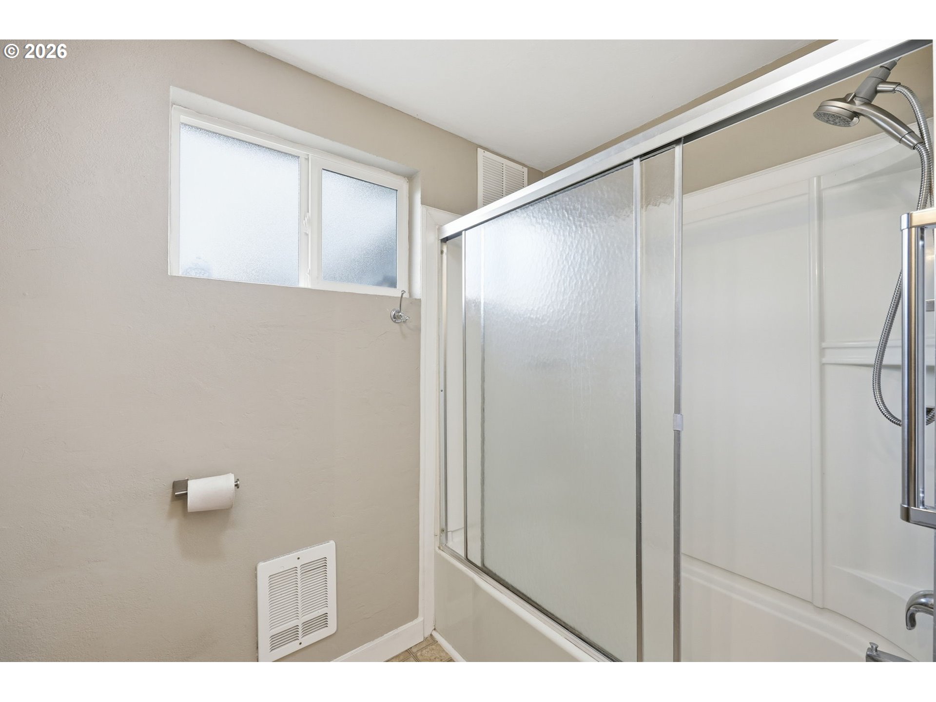 381 Marion Lane Eugene, OR 97404 - Photo 16 of 39 a bathroom with a shower and a mirror