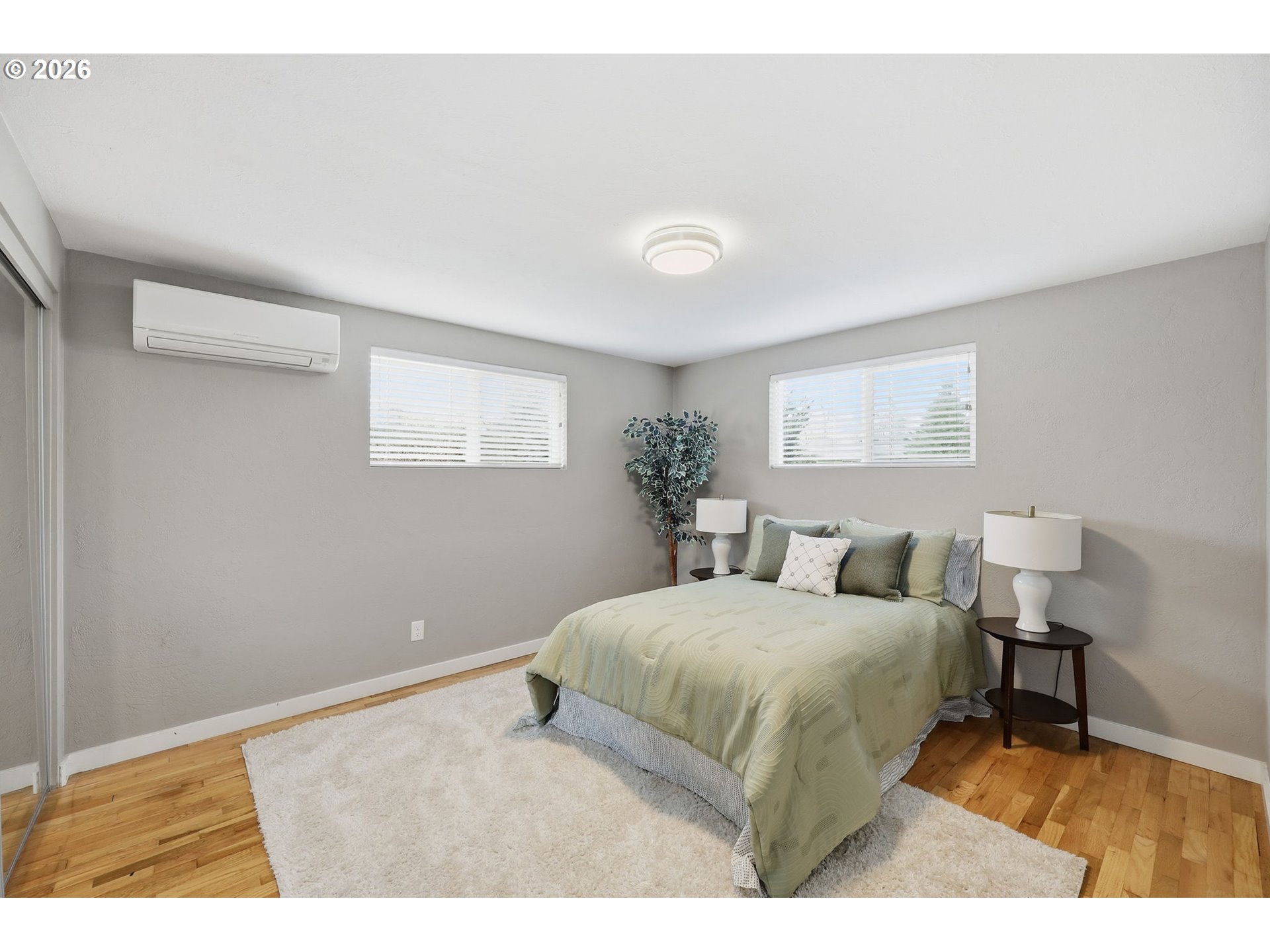 381 Marion Lane Eugene, OR 97404 - Photo 17 of 39 a bedroom with a bed and a table