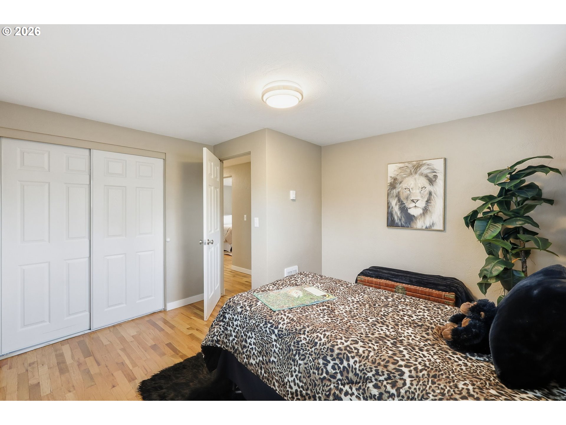 381 Marion Lane Eugene, OR 97404 - Photo 19 of 39 a bedroom with a bed and a view of bathroom