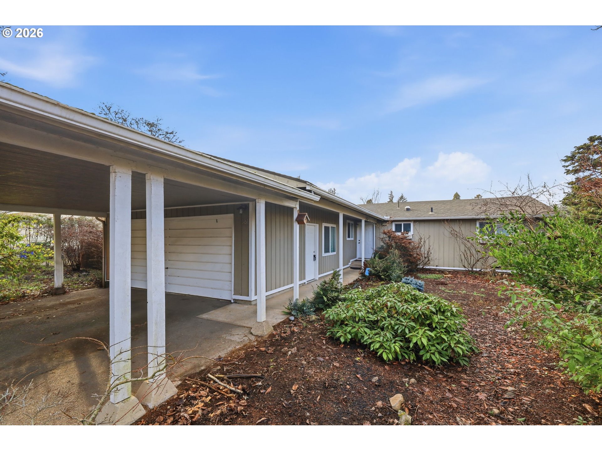 381 Marion Lane Eugene, OR 97404 - Photo 2 of 39 a view of a house with a patio
