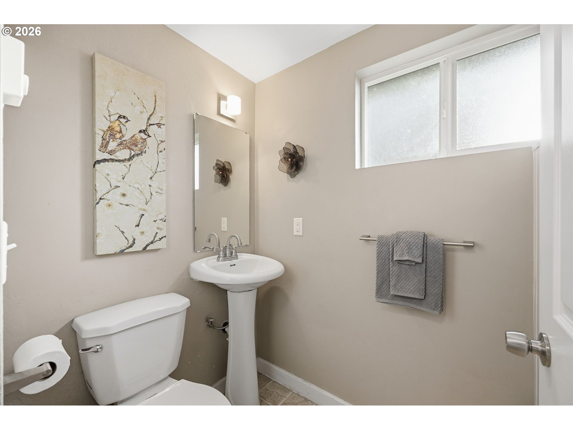 381 Marion Lane Eugene, OR 97404 - Photo 21 of 39 a bathroom with a toilet sink and mirror