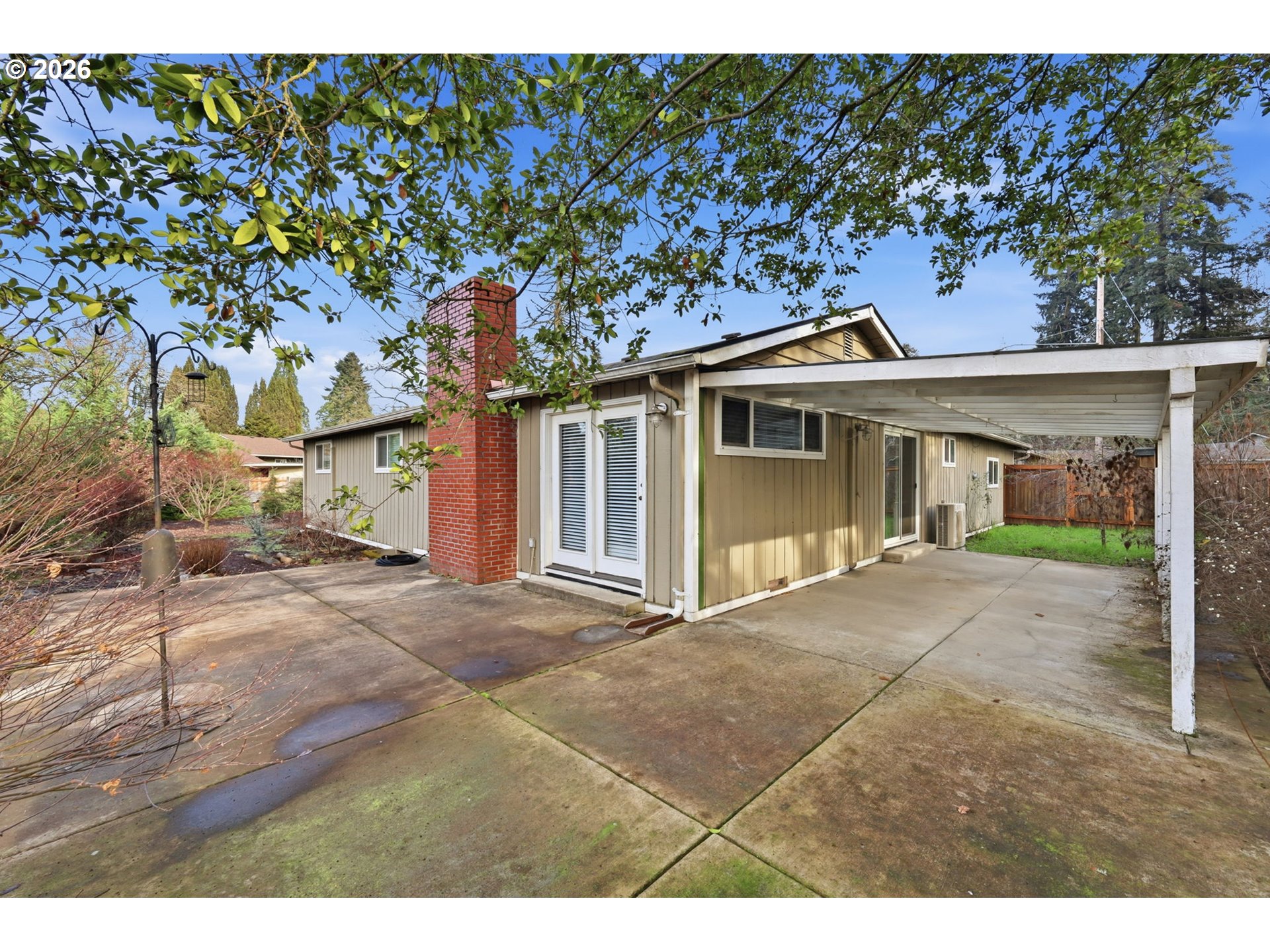 381 Marion Lane Eugene, OR 97404 - Photo 26 of 39 a front view of a house with a garden
