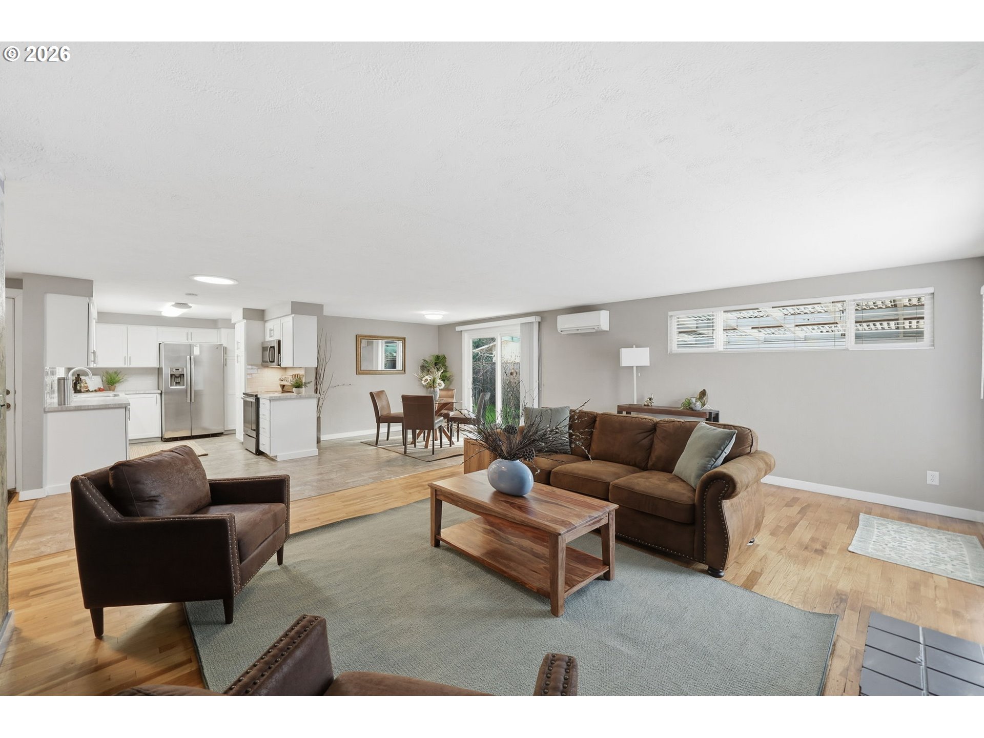 381 Marion Lane Eugene, OR 97404 - Photo 3 of 39 a living room with furniture and a large window