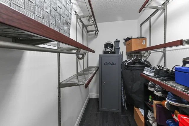 a view of an entryway with wooden floor