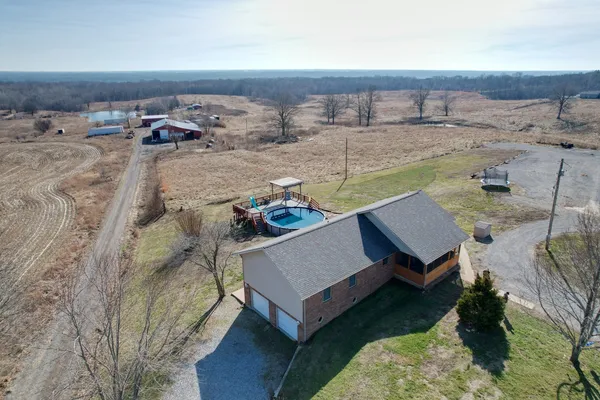 a view of a terrace with furniture and stove