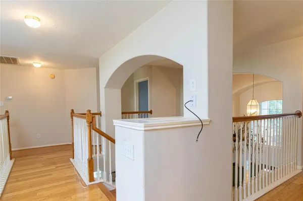 a view of entryway with wooden floor