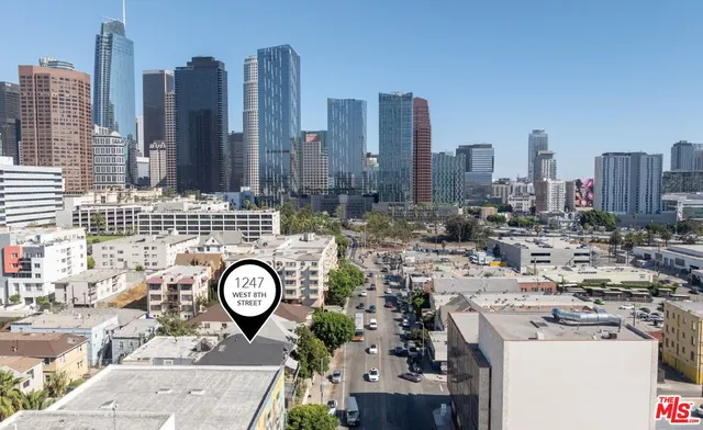 a view of a city with tall buildings