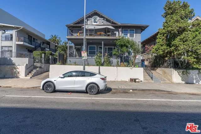 a car parked in front of a house