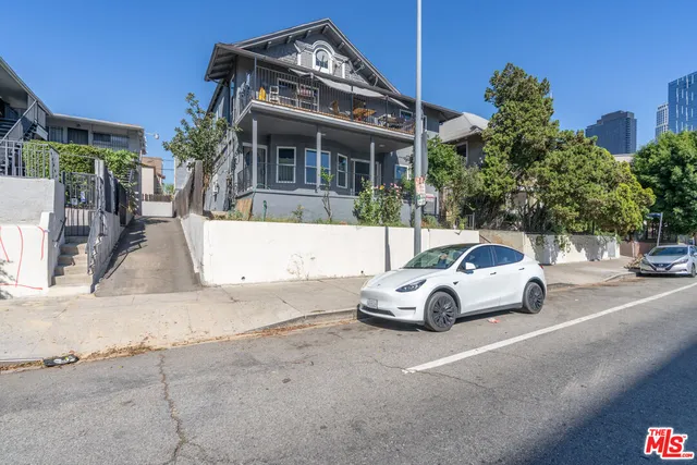 a car parked in front of a house