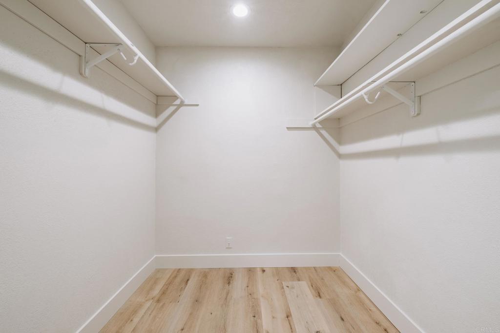 1027 San Abella Drive Encinitas, CA 92024 - Photo 17 of 27 a view of small space with racks on the wall