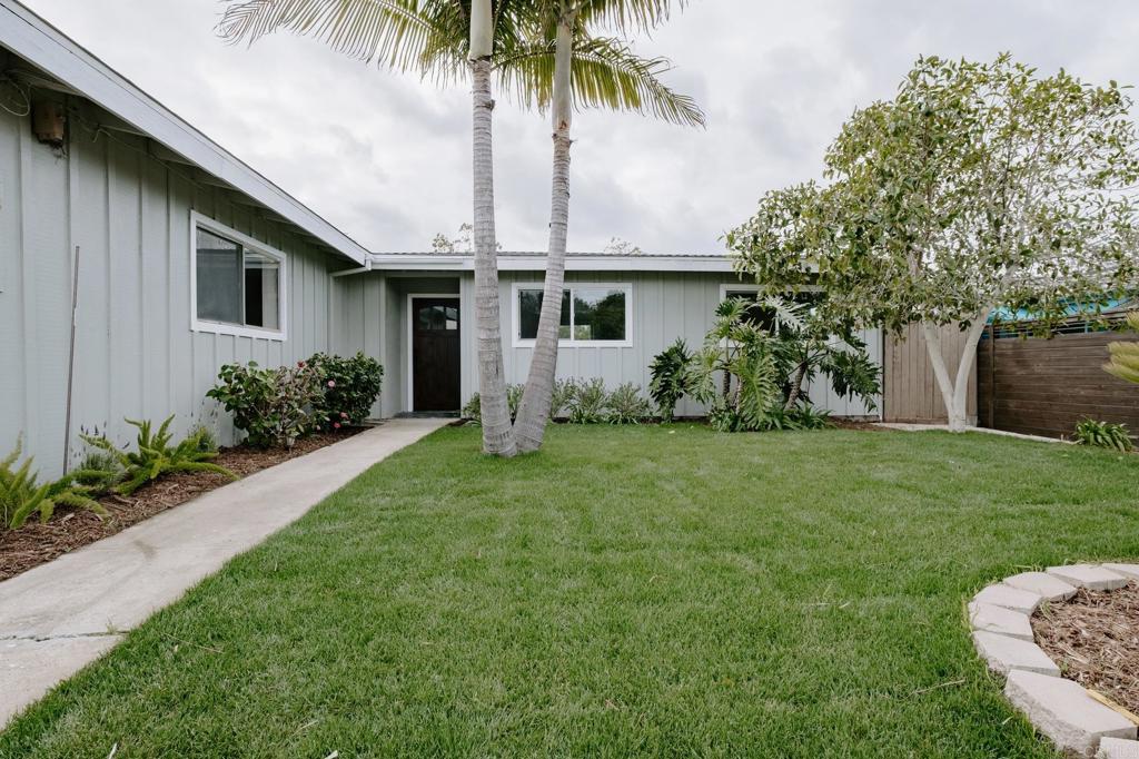 1027 San Abella Drive Encinitas, CA 92024 - Photo 21 of 27 a front view of house with yard and green space