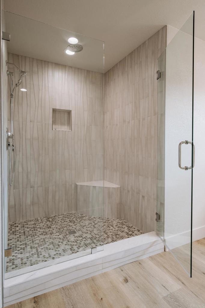 1027 San Abella Drive Encinitas, CA 92024 - Photo 25 of 27 a view of a bathroom with a shower