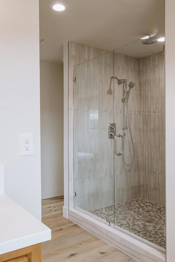 1027 San Abella Drive Encinitas, CA 92024 - Photo 26 of 27 a bathroom with a shower