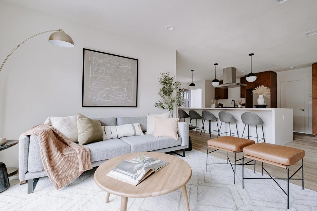 1027 San Abella Drive Encinitas, CA 92024 - Photo 5 of 27 a living room with furniture and wooden floor