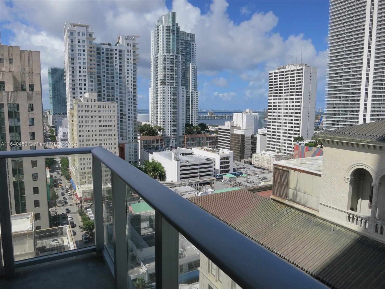 151 Southeast 1st Street, Unit 1902 Miami, FL 33131 - Photo 16 of 21 a view of balcony and chairs