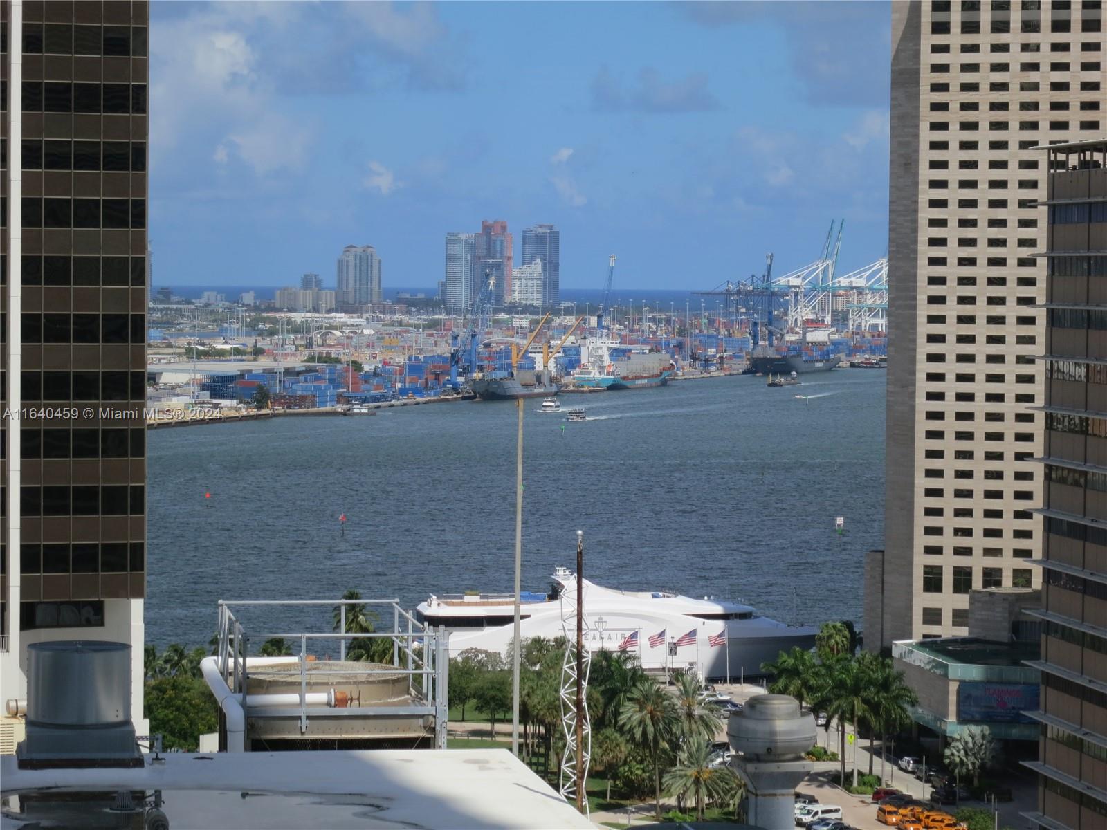 151 Southeast 1st Street, Unit 1902 Miami, FL 33131 - Photo 17 of 21 a view of a city with tall buildings