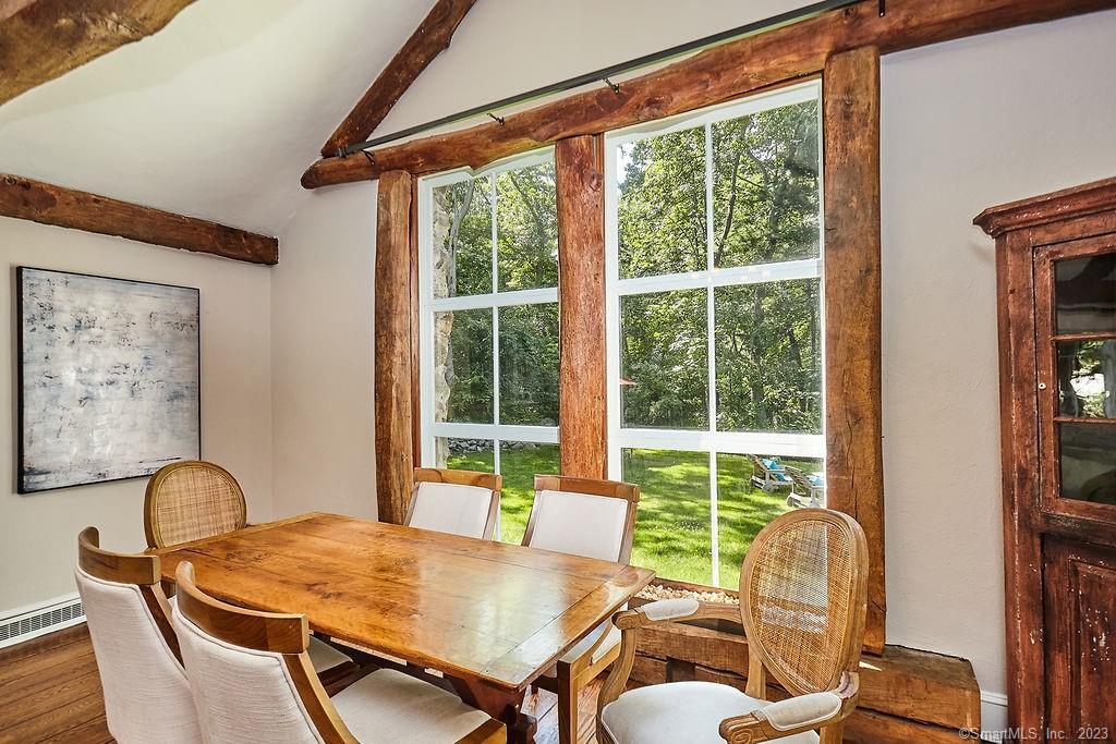 94 Partrick Road Westport, CT 06880 - Photo 6 of 17 a view of a dining room with furniture and a window