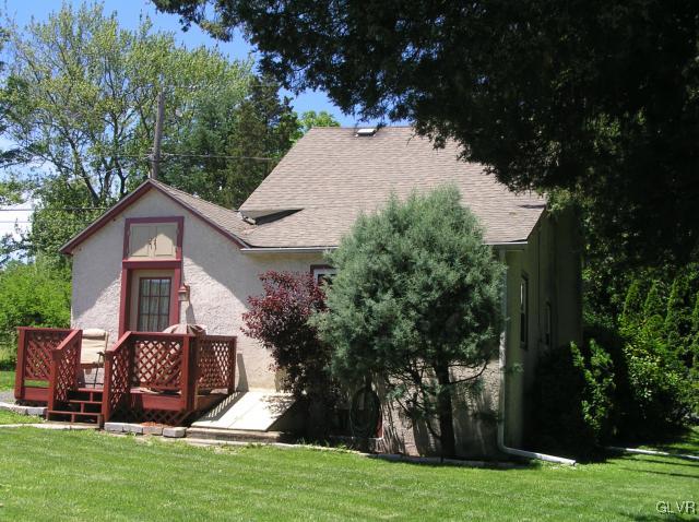 5810 Locust Valley Road Coopersburg, PA 18036 - Photo 15 of 23 a front view of a house with a yard