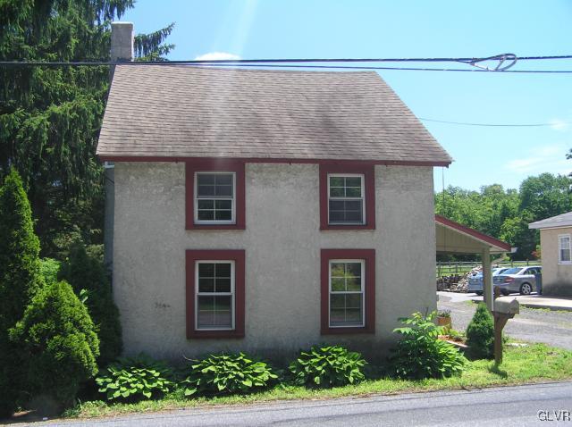 5810 Locust Valley Road Coopersburg, PA 18036 - Photo 18 of 23 a front view of a house with a yard