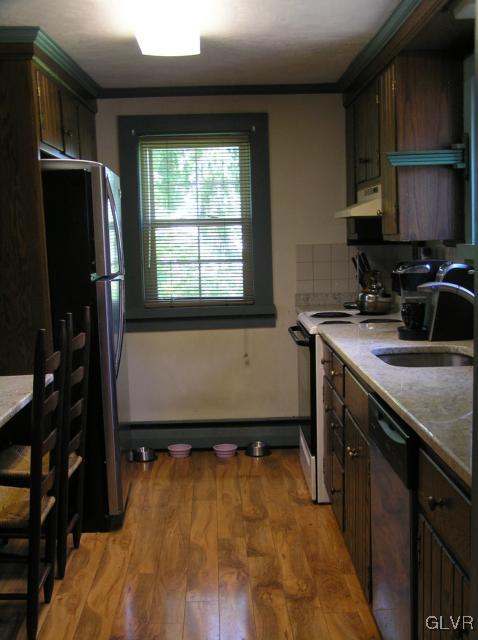 5810 Locust Valley Road Coopersburg, PA 18036 - Photo 2 of 23 a kitchen with a sink appliances and cabinets
