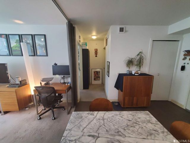 a living room with furniture and a couch