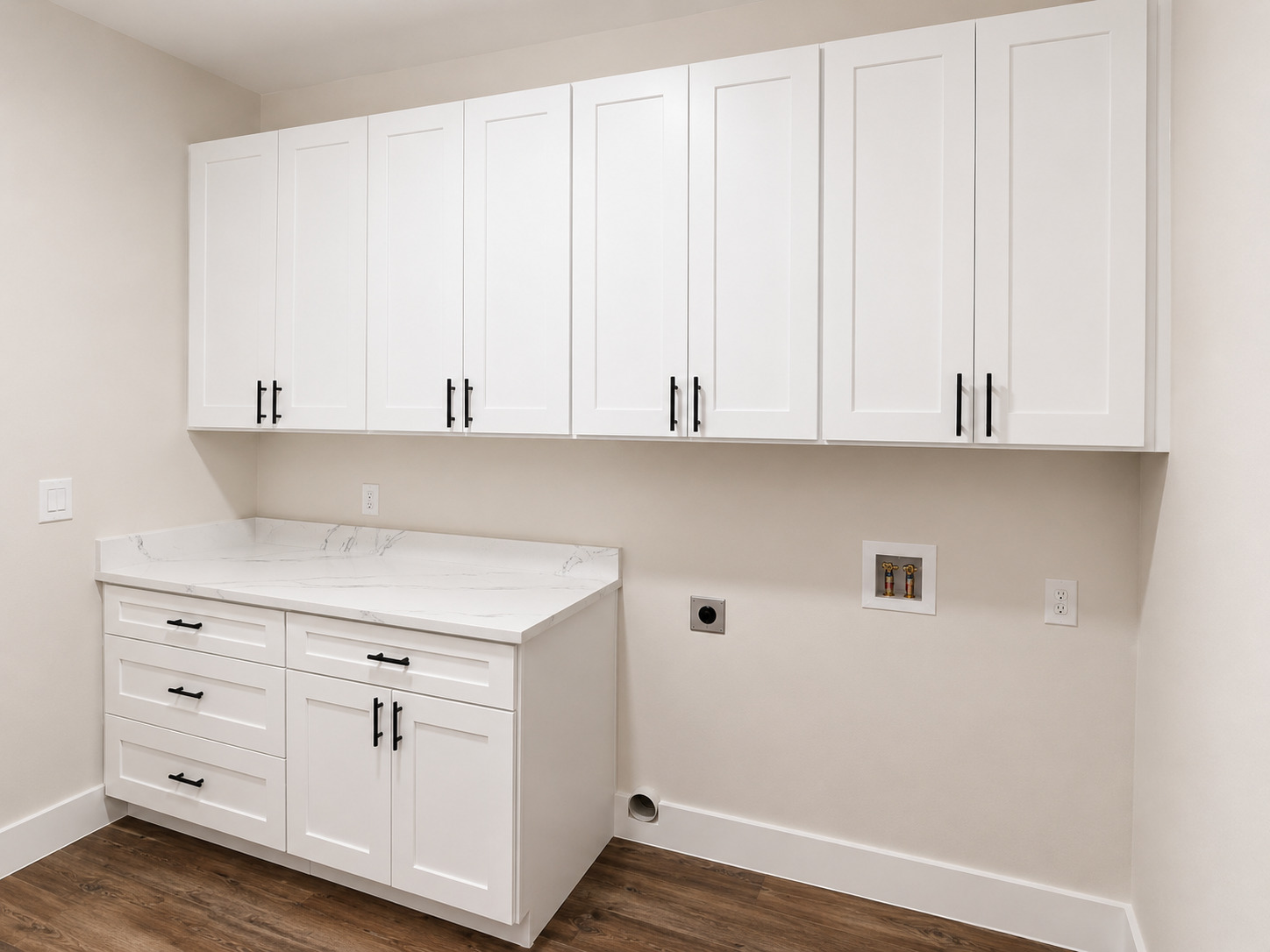 488 County Road 468 Elgin, TX 78621 - Photo 11 of 12 Ample storage and a sleek countertop define this well-appointed laundry space.