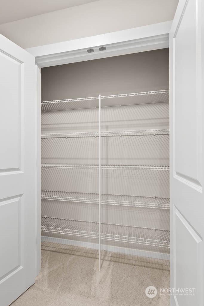 18937 Liberty Rdg Lane, Unit 955 Puyallup, WA 98374 - Photo 14 of 19 a view of an empty walk in closet