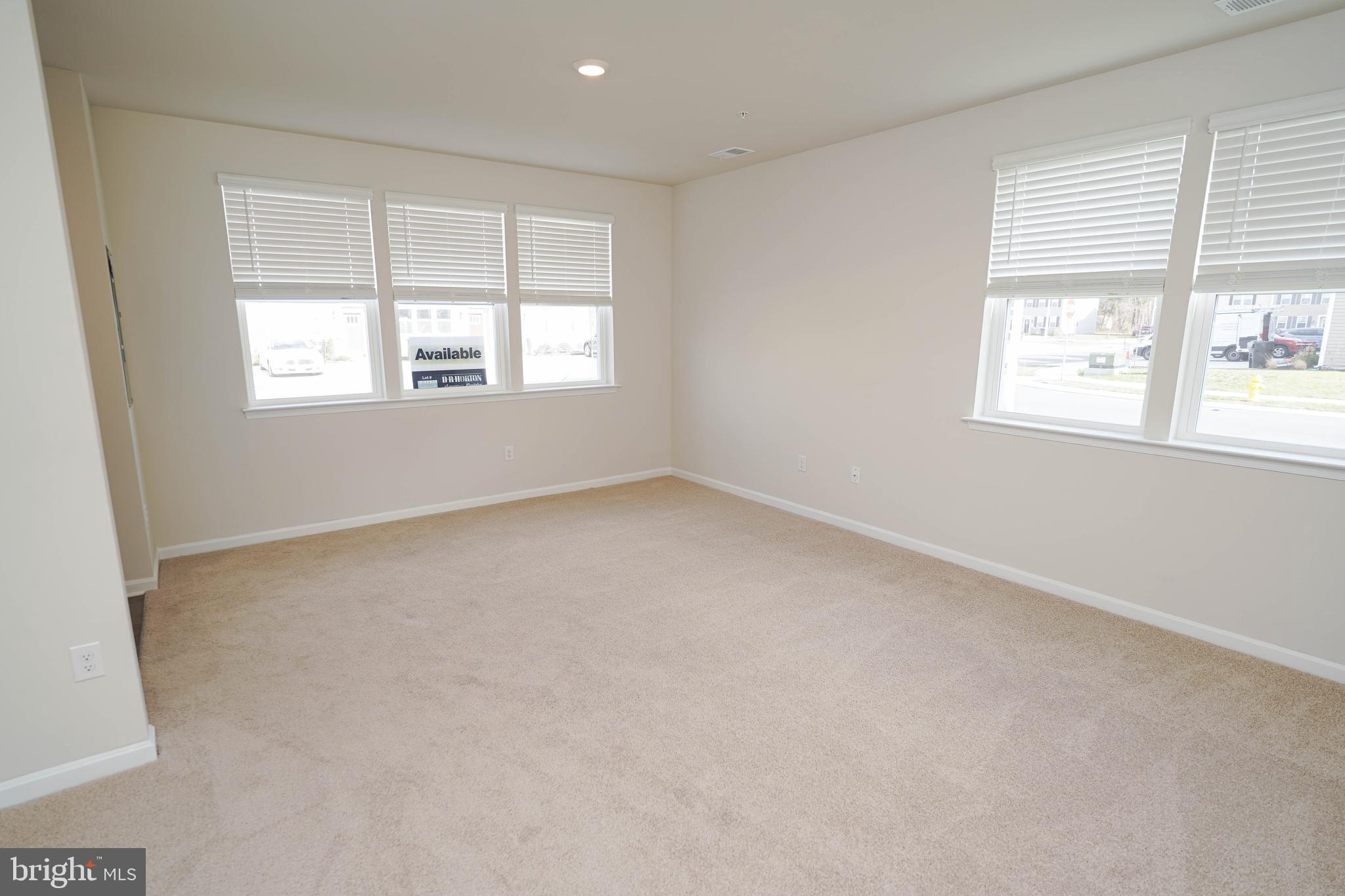 826 Derwent Lane Salisbury, MD 21801 - Photo 11 of 45 an empty room with windows