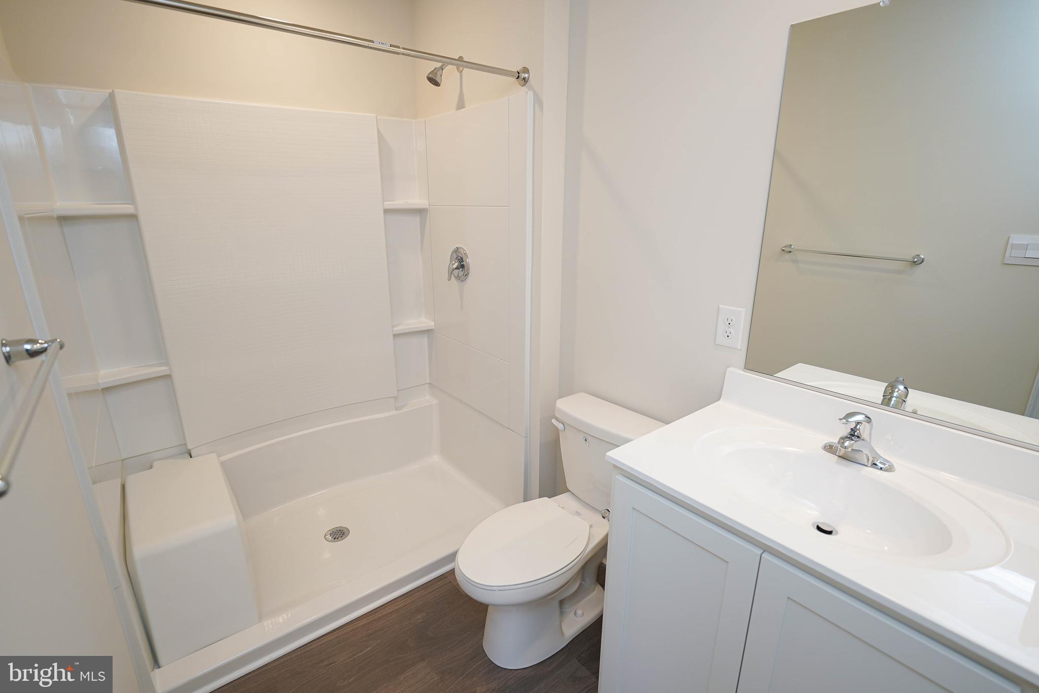 826 Derwent Lane Salisbury, MD 21801 - Photo 30 of 45 a bathroom with a sink toilet and shower