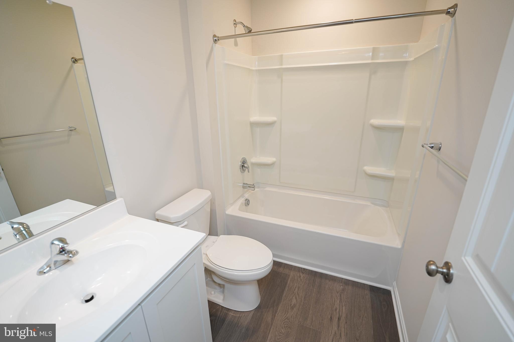 826 Derwent Lane Salisbury, MD 21801 - Photo 38 of 45 a bathroom with a sink a toilet and shower