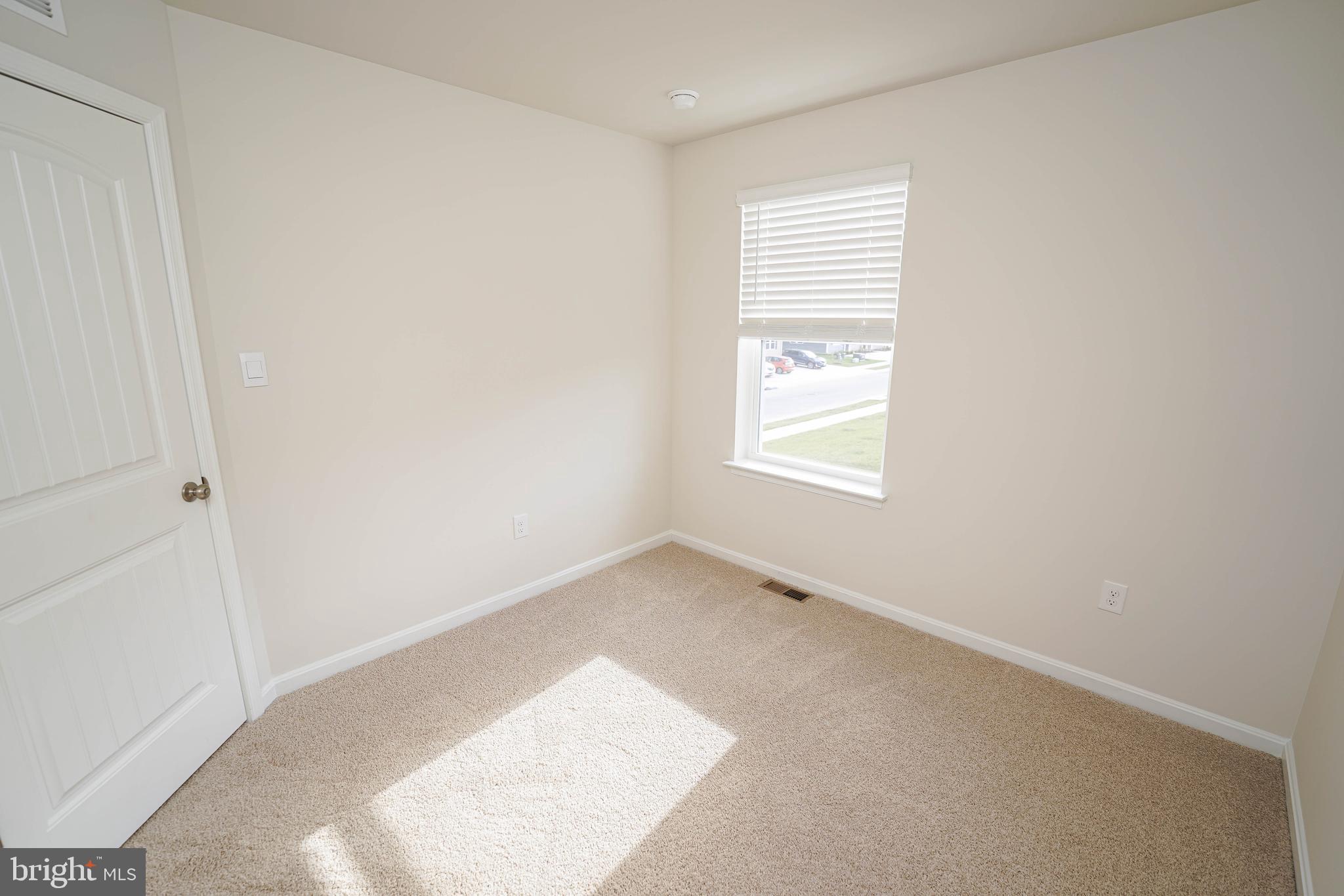 826 Derwent Lane Salisbury, MD 21801 - Photo 42 of 45 an empty room with windows