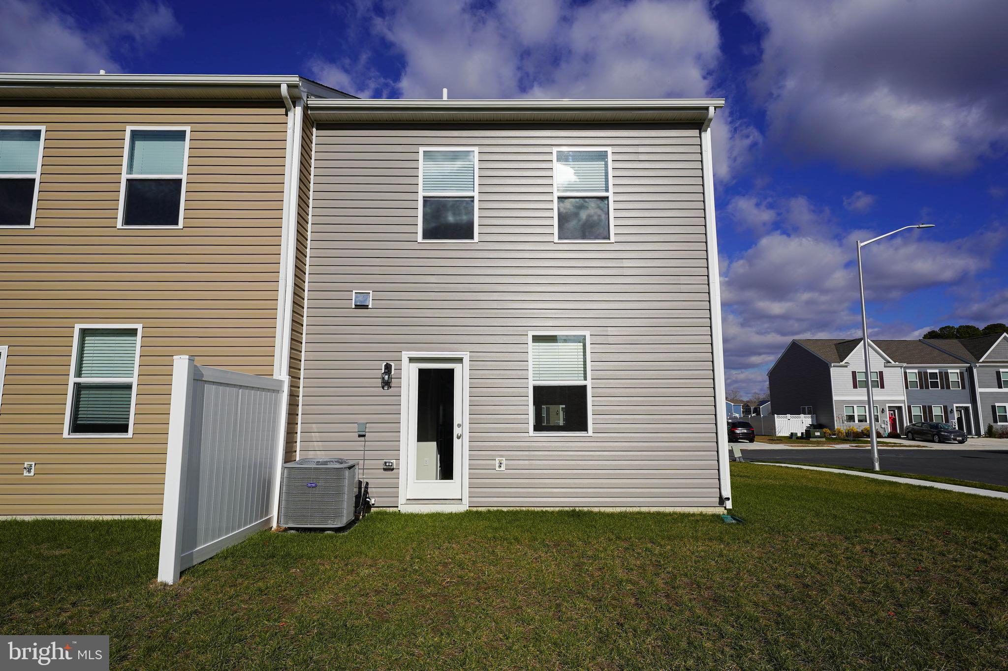 826 Derwent Lane Salisbury, MD 21801 - Photo 5 of 45 a view of a house with a yard