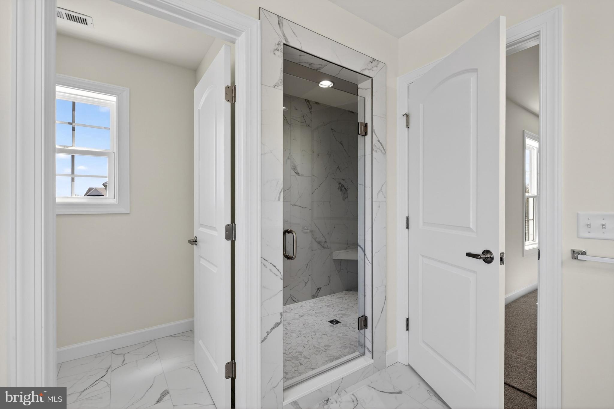 107 Nicholas Court New Castle, DE 19720 - Photo 34 of 69 a bathroom with a glass shower door