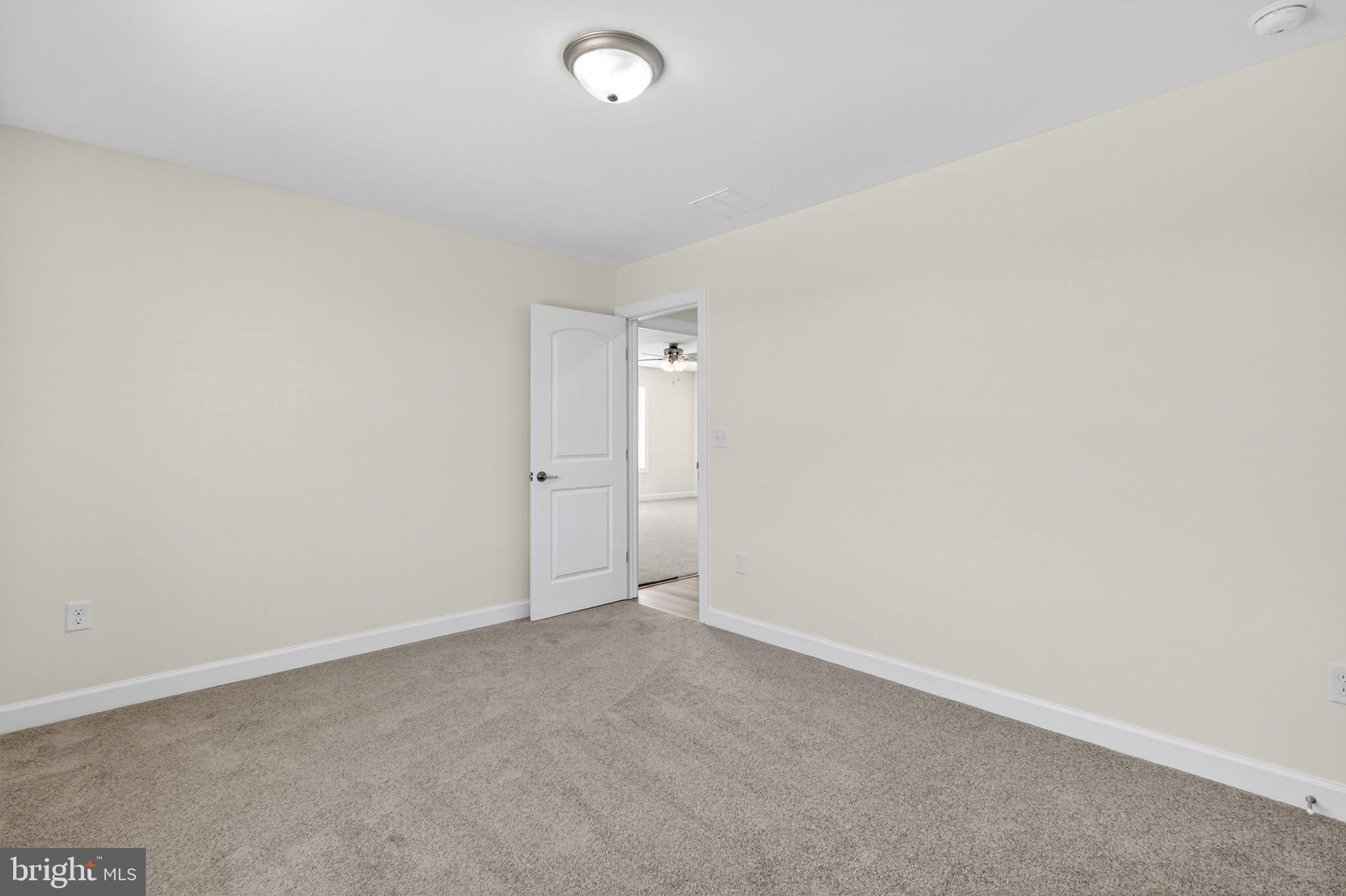 107 Nicholas Court New Castle, DE 19720 - Photo 44 of 69 an empty room with an entryway