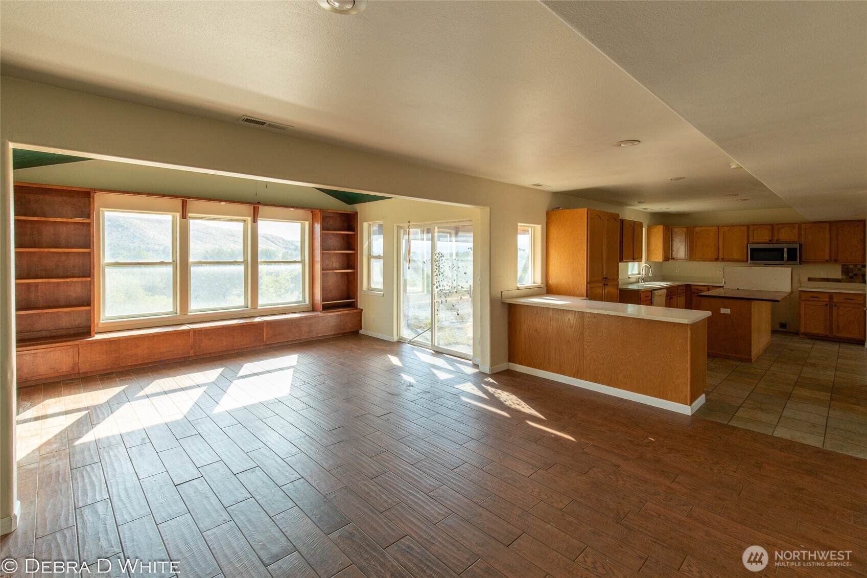 2 Kruse Street Omak, WA 98841 - Photo 11 of 23 a view of a kitchen with a sink and a large window