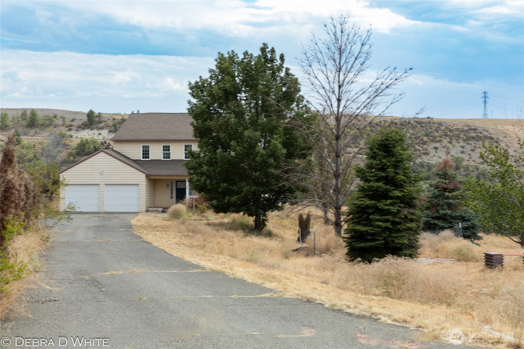 2 Kruse Street Omak, WA 98841 - Photo 21 of 23 a view of a house with a snow in the background