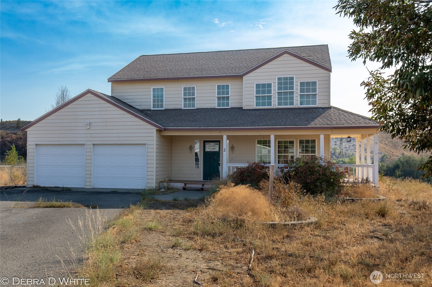 2 Kruse Street Omak, WA 98841 - Photo 23 of 23 a front view of a house with a yard
