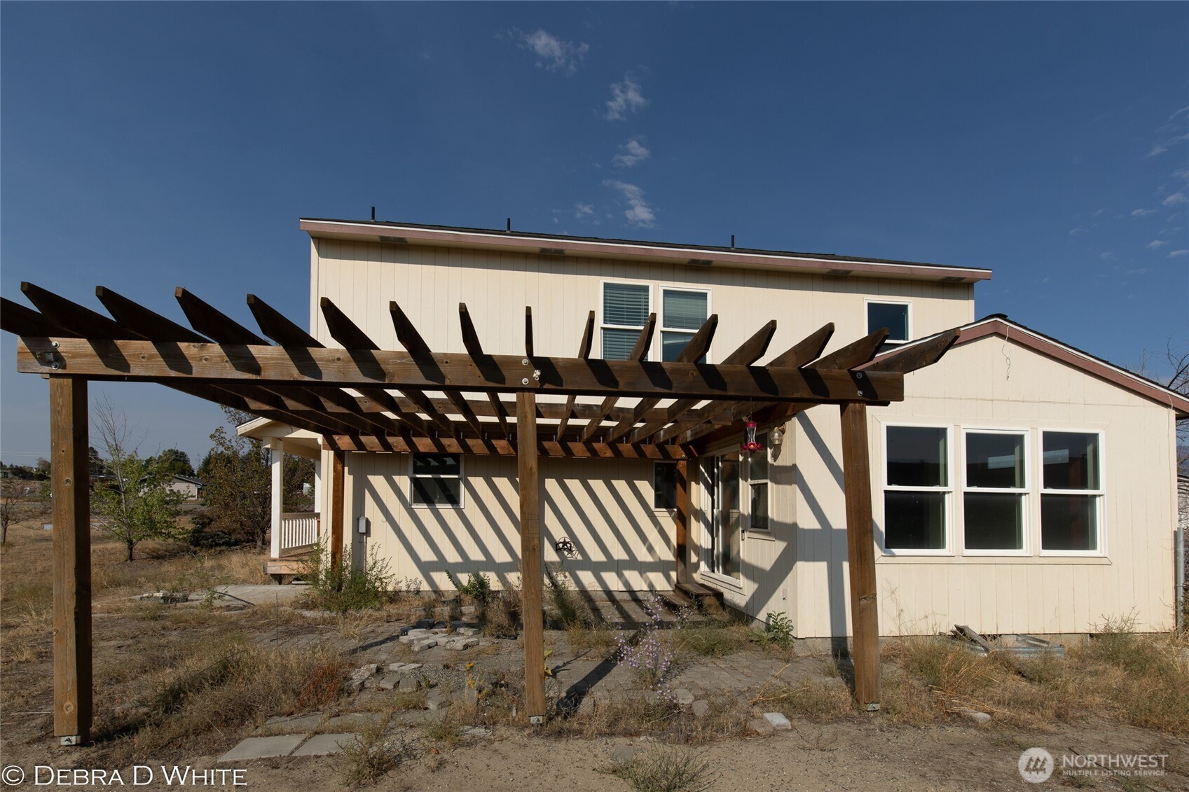 2 Kruse Street Omak, WA 98841 - Photo 4 of 23 a view of a house with backyard